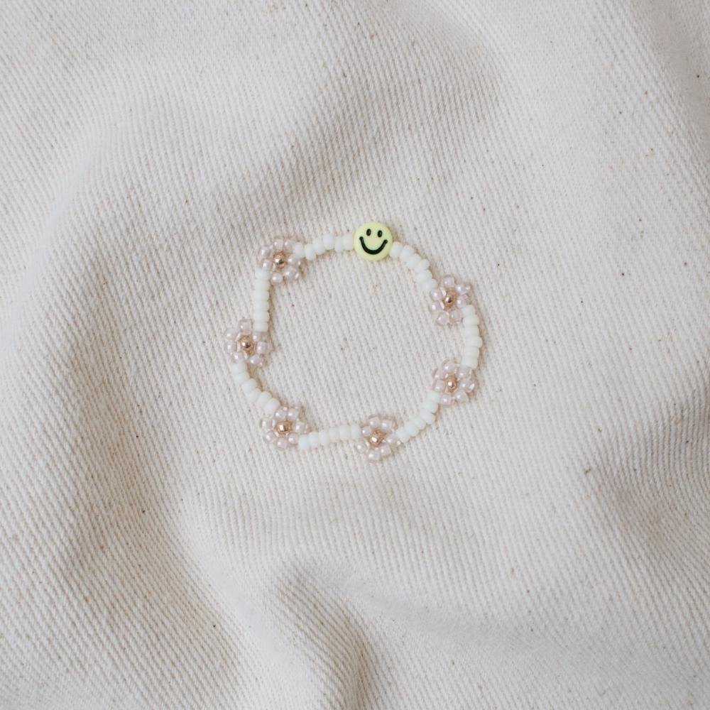 Armband kids| The daisy bracelet pink smiley elastisch 3-6 jr.