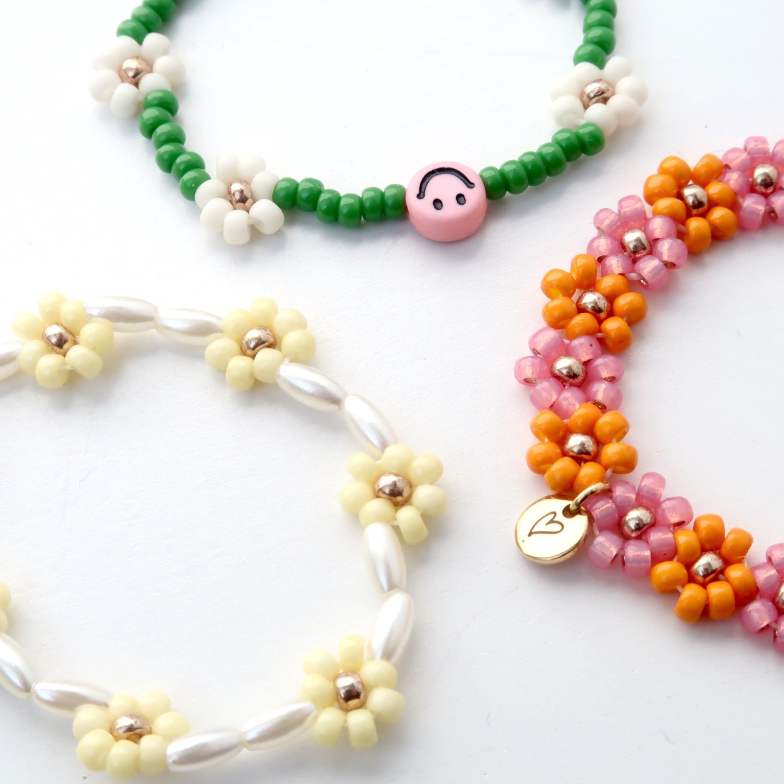 LOVEissue bracelet daisy | Elastic orange, pink T1